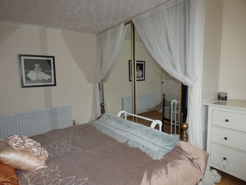 Bedroom One- click for photo gallery